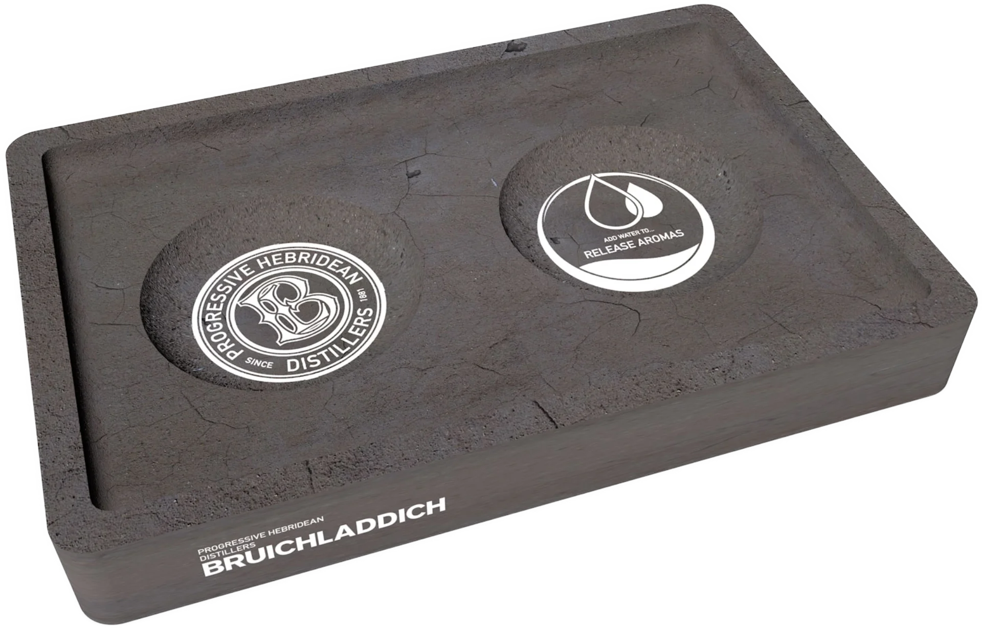 The papercrete dram tray with the distillery seal and Release Aromas water drop decals