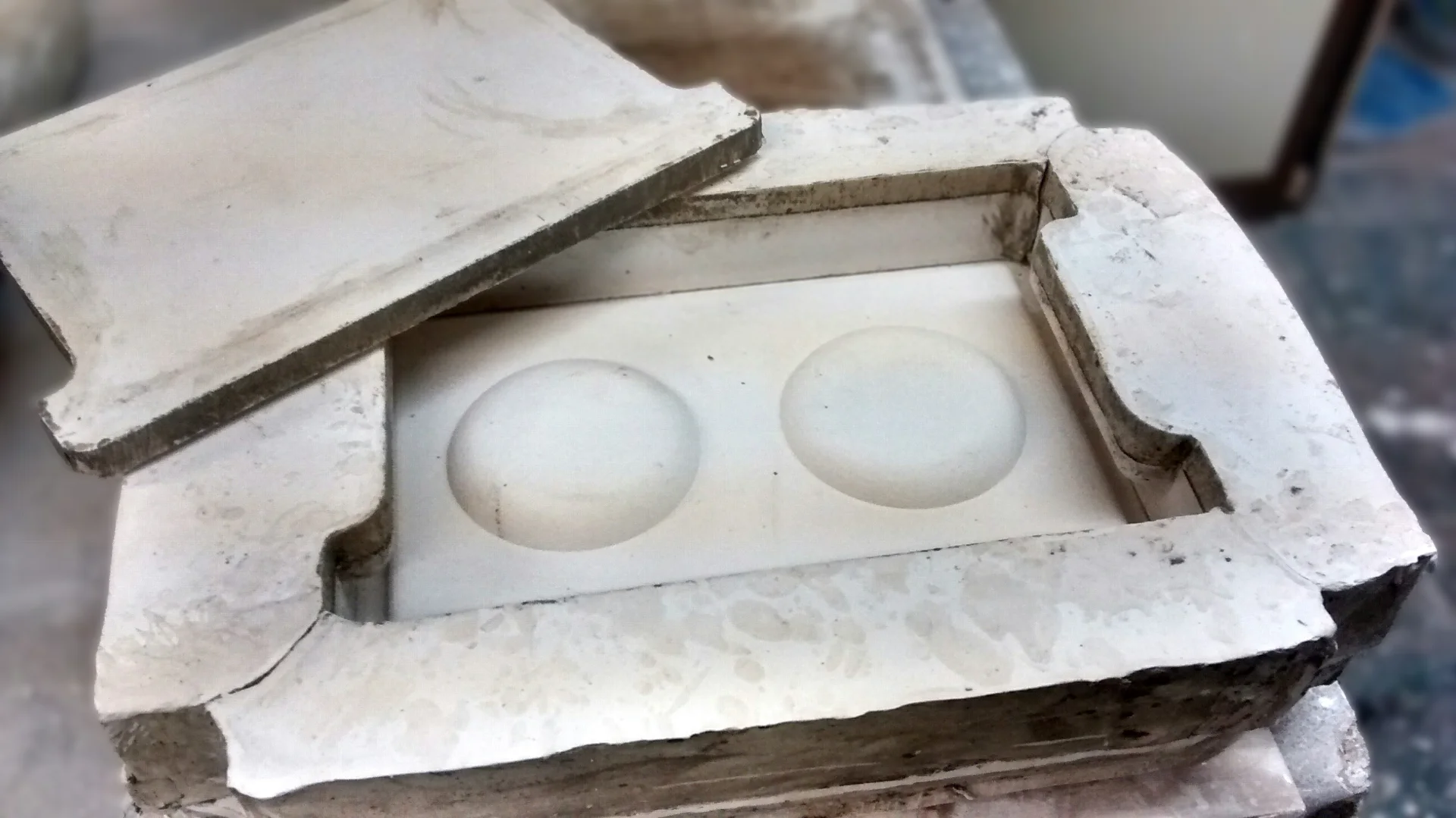 The plaster mould used to cast the dram tray